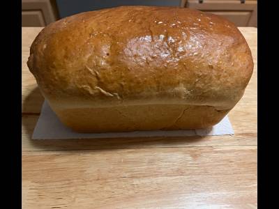 loaf fresh out of the oven and coated with butter