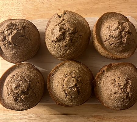 6 muffins on a cutting board