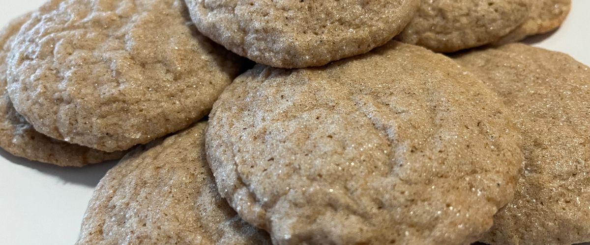 Close up of a plate of apple pie cookies on a white plate