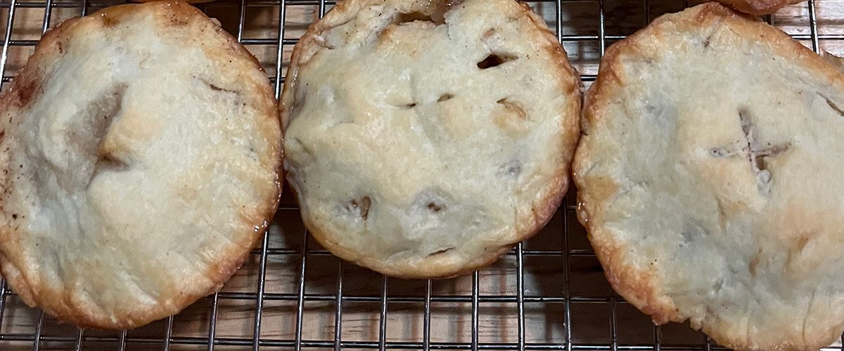 Close-up of a row mini apple pies