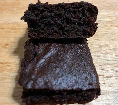 close up of 6 brownies, three flat and three angled to show the sides