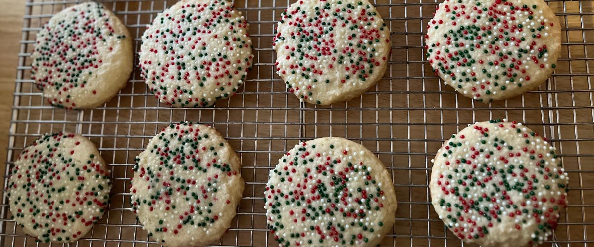 sprinkle butter cookies on a cooling rack