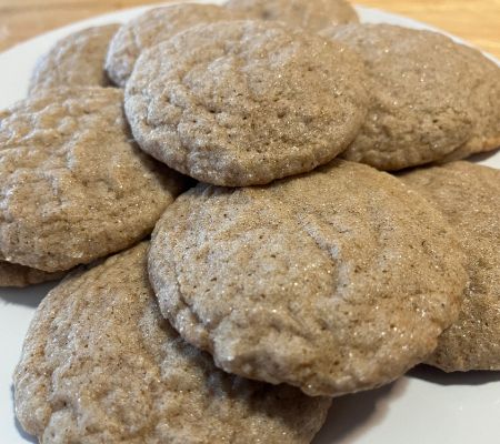 Close up of a plate of apple pie cookies on a white plate