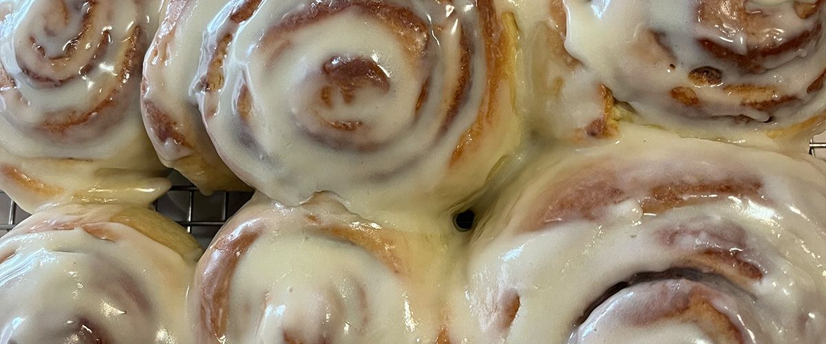 close up shot of iced cinnamon rolls