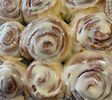 close up shot of iced cinnamon rolls