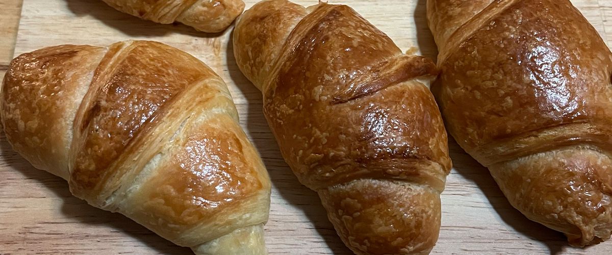 Croissants on a wooden board