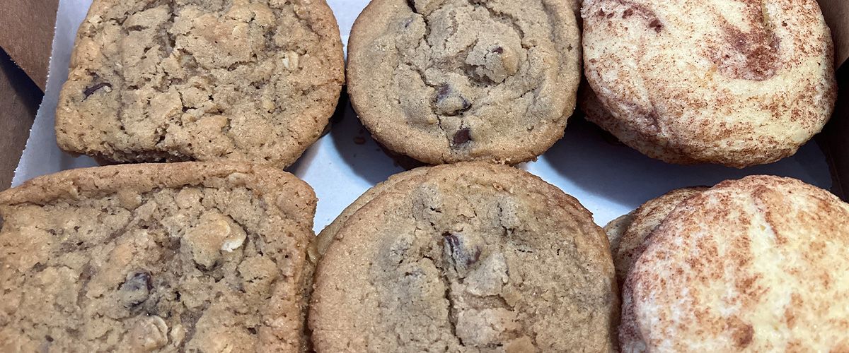 box of three columns of cookies: oatmeal raisin, chocolate chip, and snickerdoodle